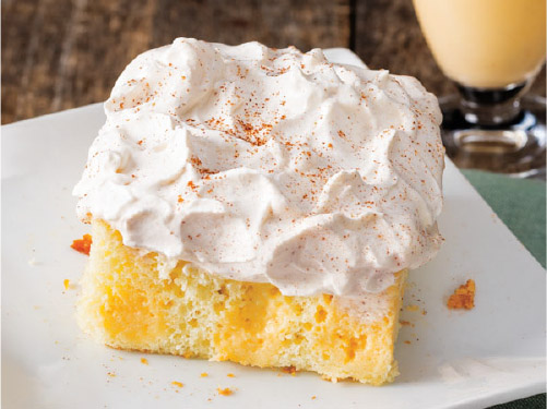Eggnog Poke Cake with Cinnamon Whipped Cream