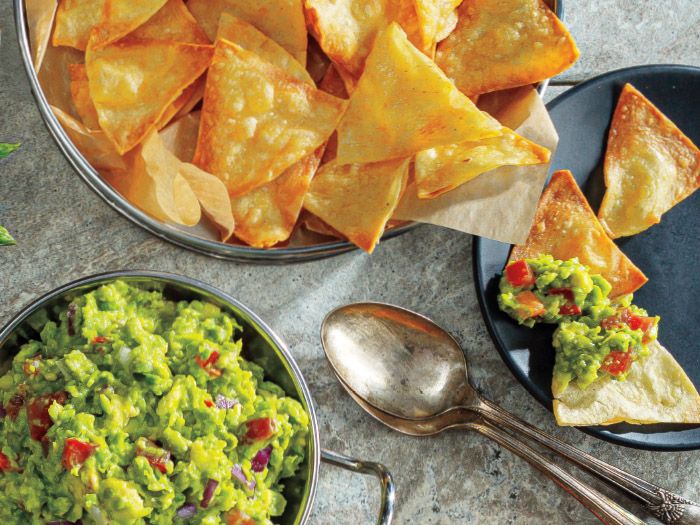 Pea Guacamole Dip with Baked Tortilla Chips